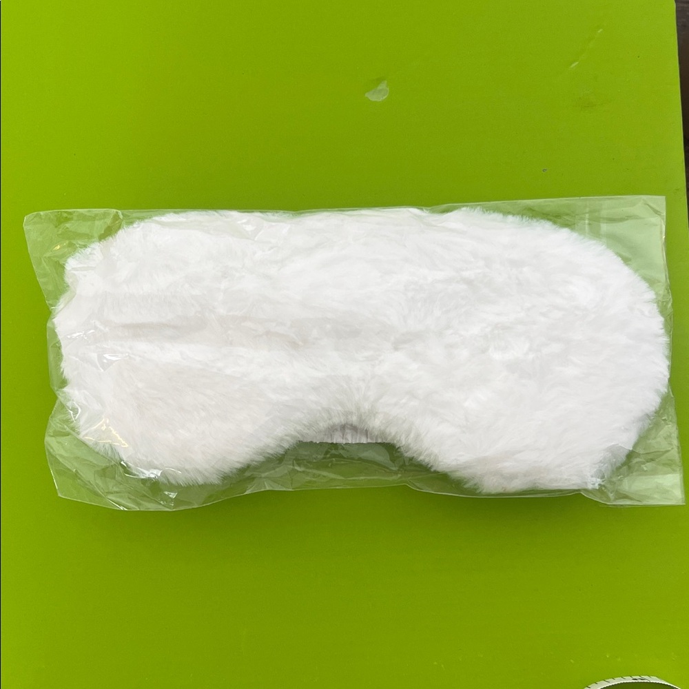 Fluffy white sleep mask